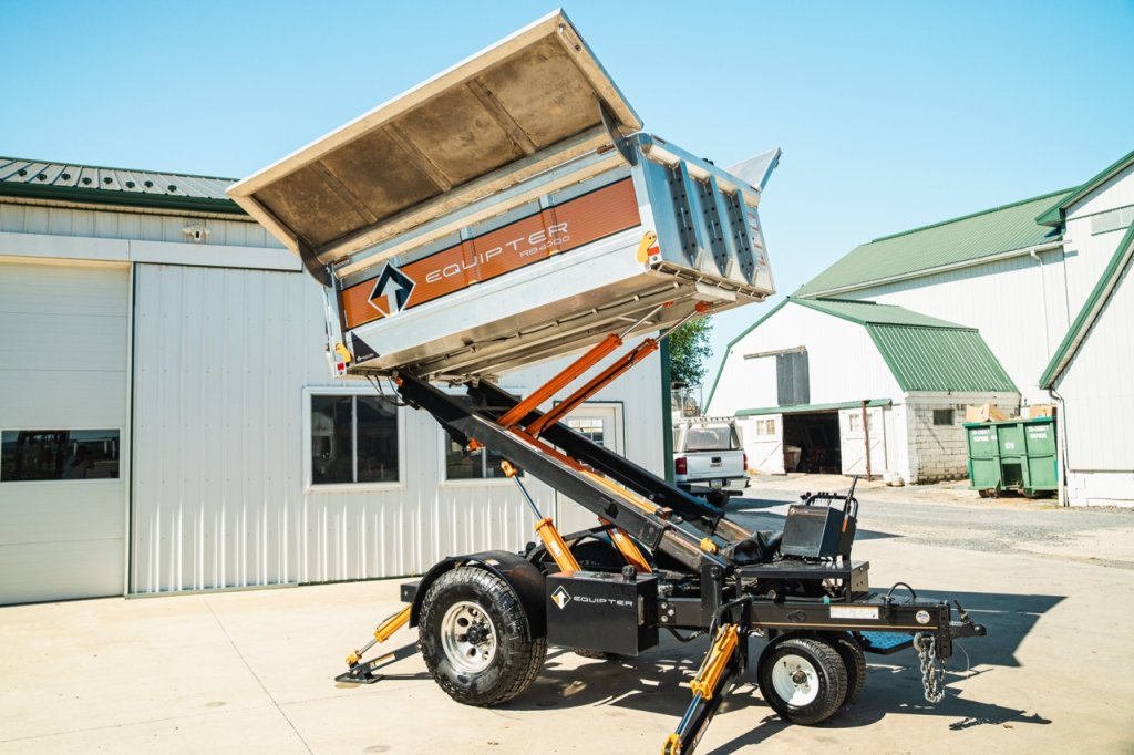 Used Equipter RB4000 with the box fully raised, showing the hydraulic lift system buyers inspect before an offer
